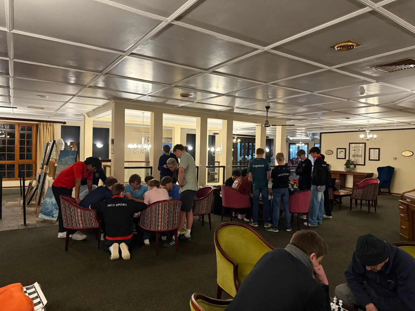 Players gathered around a tournament table during a club night.